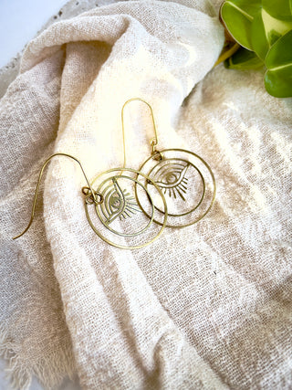 Delicate Eyes in Hoop Earrings